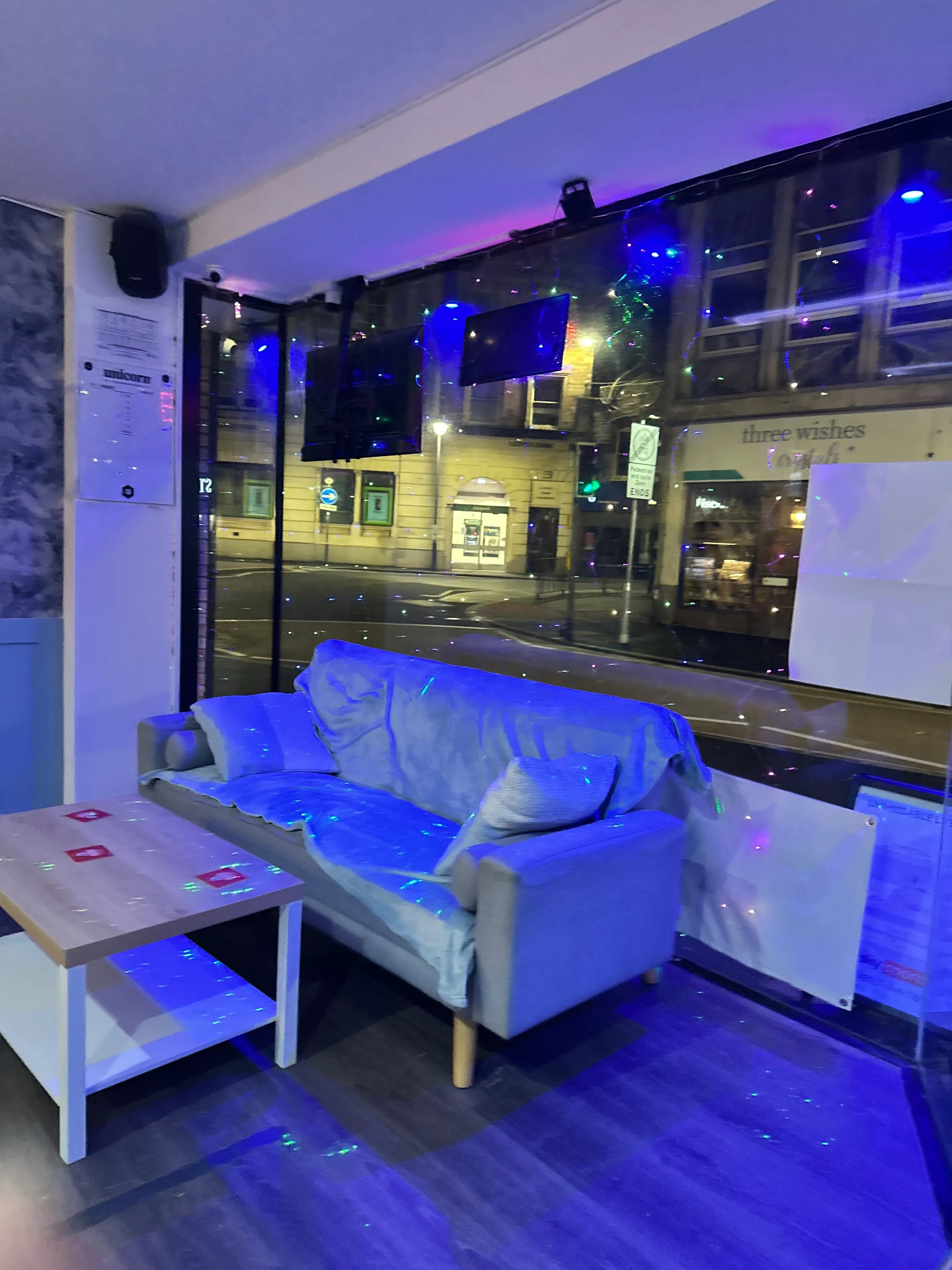 a couch with mood lighting